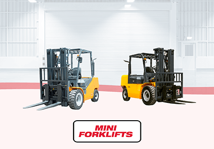 Two compact UN mini forklifts for light material handling tasks.
